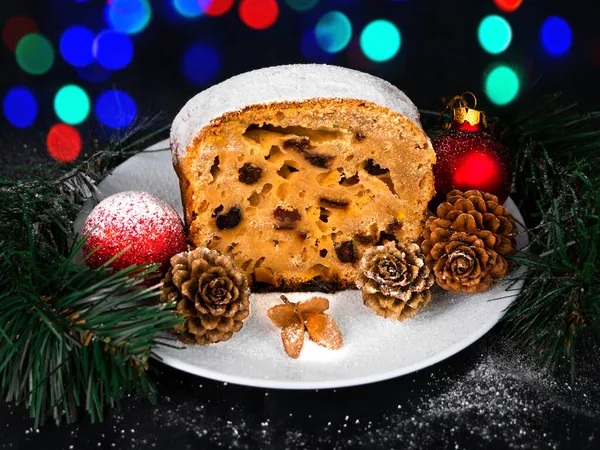 Christmas Fruitcake Powdered Sugar Dark Background Bokeh Lights Seasonal Decoration — Stock Photo, Image