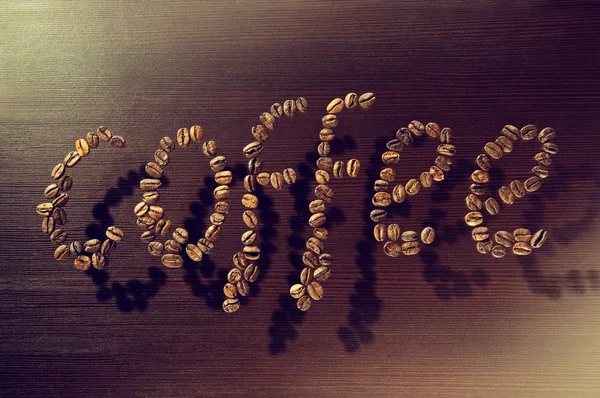 Palavra de café feito de feijão — Fotografia de Stock