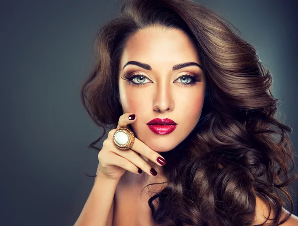 Sensual brunette with ring on her finger — Stock Photo, Image