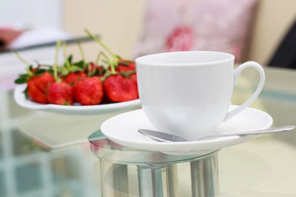 Kaffe och strawberry bakgrund. — Stockfoto