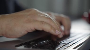 Professional user worker using typing on laptop notebook keyboard sit at home office desk. Work from home. Using a computer to work via the Internet during the COVID-19 outbreak. B roll slow motion 4k