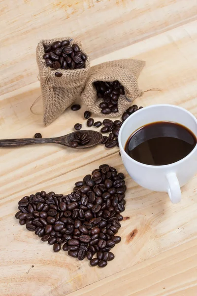 Coffee beans in heart shape — Stock Photo, Image