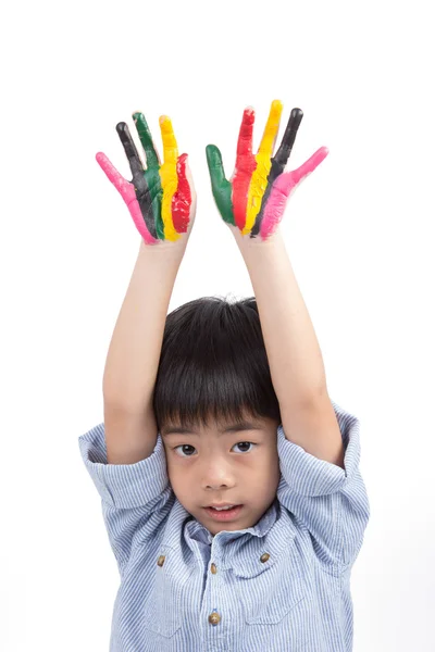 Asiatico carino ragazzo sollevare la sua colorato mani in il cielo — Foto Stock