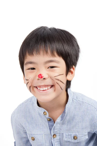 Asiático menino com rosto pintado e sorrindo — Fotografia de Stock