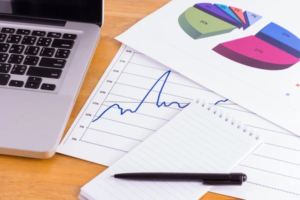 Blank notepad, documents and laptop in the office — Stock Photo, Image