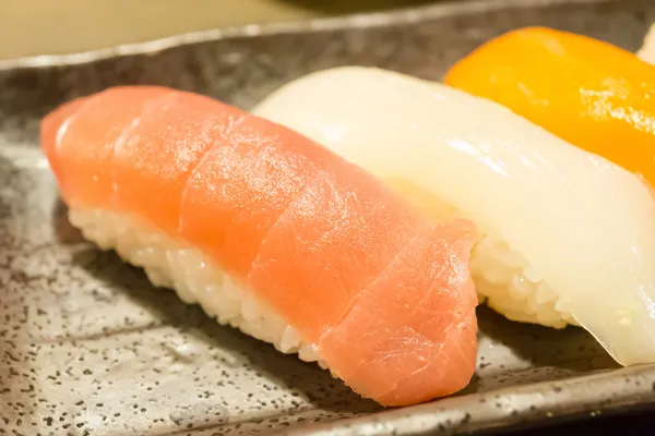 Sushi, raw fish on japanese rice — Stock Photo, Image