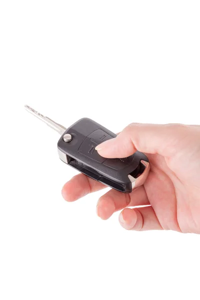 Tenuta a mano chiave auto remota isolato su sfondo bianco — Foto Stock