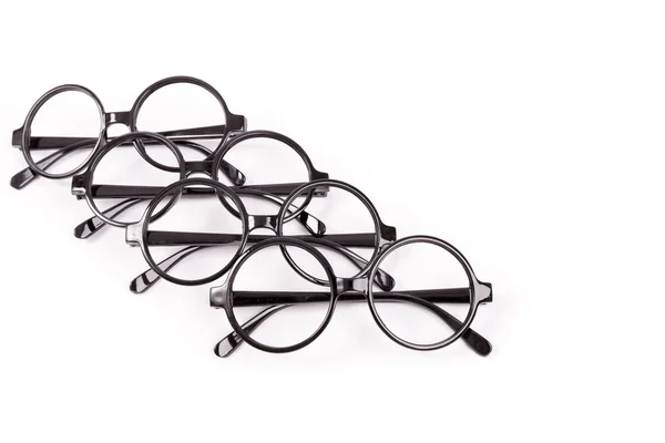 Stiva de ochelari negri izolați pe alb — Fotografie, imagine de stoc