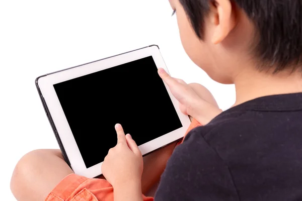 Hand eines asiatischen Jungen spielt Tablette isoliert auf weiß — Stockfoto