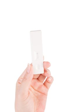Hamilelik testi üzerine beyaz izole el
