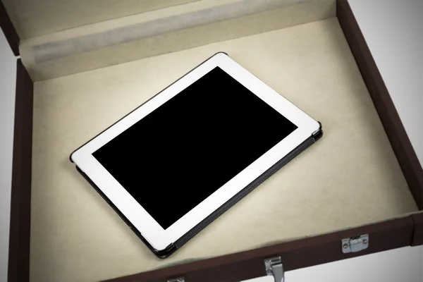 Modern white tablet pc in briefcase isolated on white (vignette — Stock Photo, Image