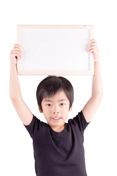 Smiling boy standing with empty horizontal blank in hands, isola — Stock Photo, Image