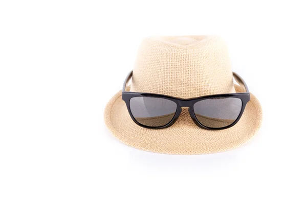 Hat and sunglasses isolated on a white background — Stock Photo, Image