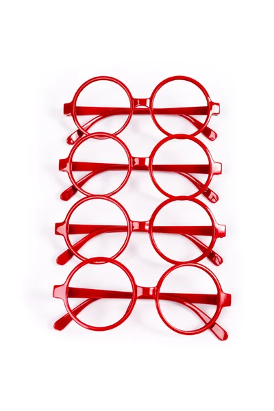 Stack of red glasses isolated on white — Stock Photo, Image