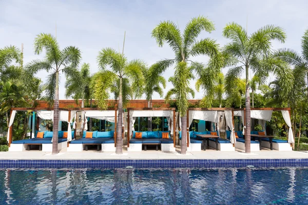 Pool bed beside the pool for relax — Stock Photo, Image