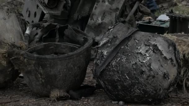 Burnt Military Helmets Ground — стоковое видео