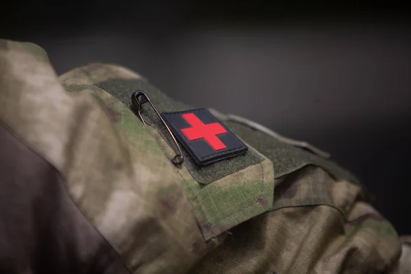 Chevron of a military medic on a military uniform