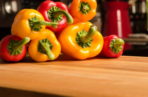 Pile of peppers in kitchen — Stock Photo, Image