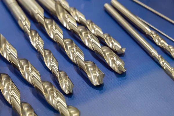 Drill for metal close-up. Tools for metal processing. Metalworking. Selected focus.