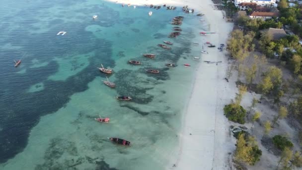 Coastal landscape of Zanzibar, Tanzania - boats near the shore — Stock Video