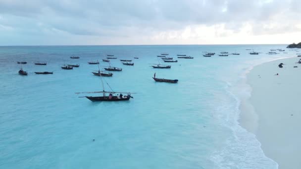 Coastal landscape of Zanzibar, Tanzania - boats near the shore — Stock Video