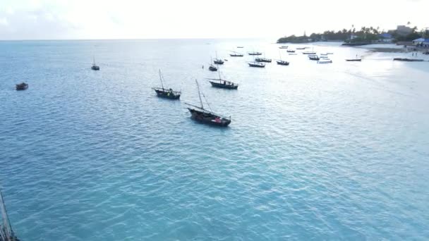 Boats in the ocean near the coast of Zanzibar, Tanzania, slow motion — Stock Video