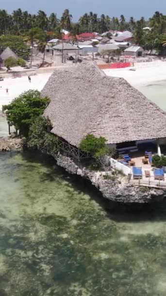 Vertical video house on stilts in the ocean on the coast of Zanzibar, Tanzania — Stock video