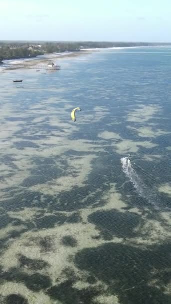 Vertical video kitesurfing near the shore of Zanzibar, Tanzania — Stock Video