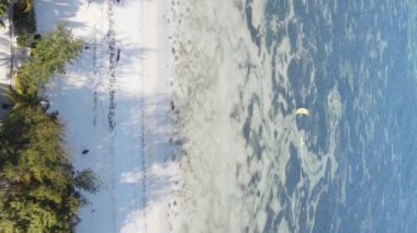 Zanzibar, Tanzania - vertical video of the ocean near the coast, slow motion