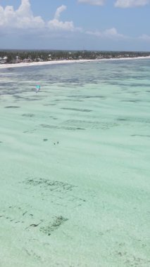 Zanzibar, Tanzania - vertical video of the ocean near the coast, slow motion
