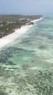 Zanzibar, Tanzania - vertical video of the ocean near the coast, slow motion