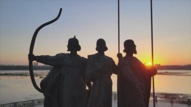 This stock video shows a monument to the founders of the city Kyiv in the morning at dawn, Ukraine in 8K resolution