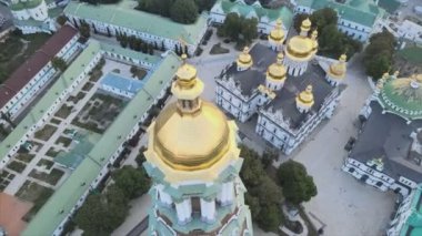 This stock video shows an aerial view of the Kyiv-Pechersk Lavra in the morning at sunrise, Ukraine in 8K resolution