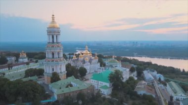 This stock video shows an aerial view of the Kyiv-Pechersk Lavra in the morning at sunrise, Ukraine in 8K resolution