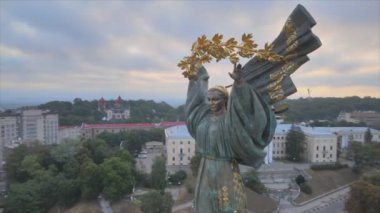 This stock footage shows aerial view of monument on Independence Square in Kyiv at dawnin 8K resolution