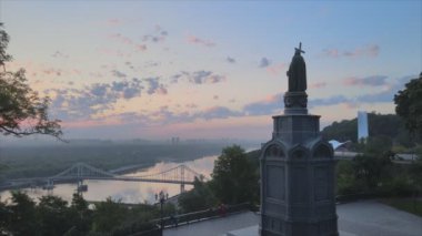 This stock footage shows aerial view of monument to Vladimir the Great at dawn in the morning in Kyiv, Ukraine in 8K resolution
