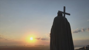 This stock footage shows aerial view of monument to Vladimir the Great at dawn in the morning in Kyiv, Ukraine in 8K resolution