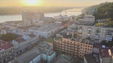 This stock footage shows aerial view of historical district of Kyiv, Ukraine - Podil in the morning at dawn in 8K resolution