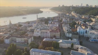This stock footage shows aerial view of historical district of Kyiv, Ukraine - Podil in the morning at dawn in 8K resolution