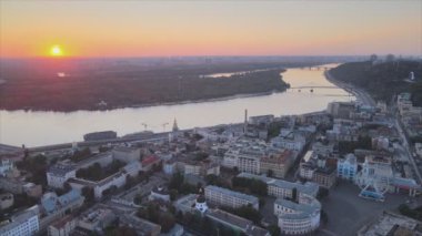 This stock footage shows aerial view of historical district of Kyiv, Ukraine - Podil in the morning at dawn in 8K resolution