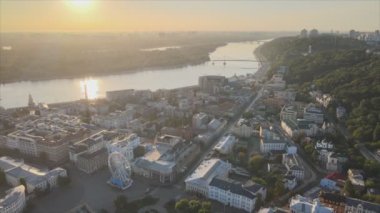 This stock footage shows aerial view of historical district of Kyiv, Ukraine - Podil in the morning at dawn in 8K resolution