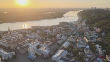 This stock footage shows aerial view of historical district of Kyiv, Ukraine - Podil in the morning at dawn in 8K resolution