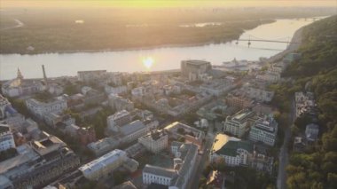This stock footage shows aerial view of historical district of Kyiv, Ukraine - Podil in the morning at dawn in 8K resolution