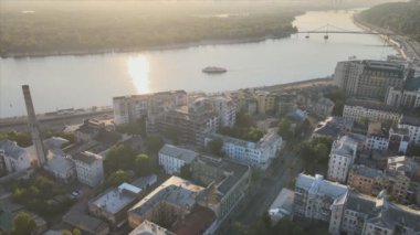 This stock footage shows aerial view of historical district of Kyiv, Ukraine - Podil in the morning at dawn in 8K resolution