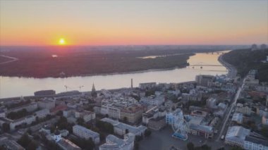 This stock footage shows aerial view of historical district of Kyiv, Ukraine - Podil in the morning at dawn in 8K resolution