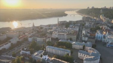 This stock footage shows aerial view of historical district of Kyiv, Ukraine - Podil in the morning at dawn in 8K resolution