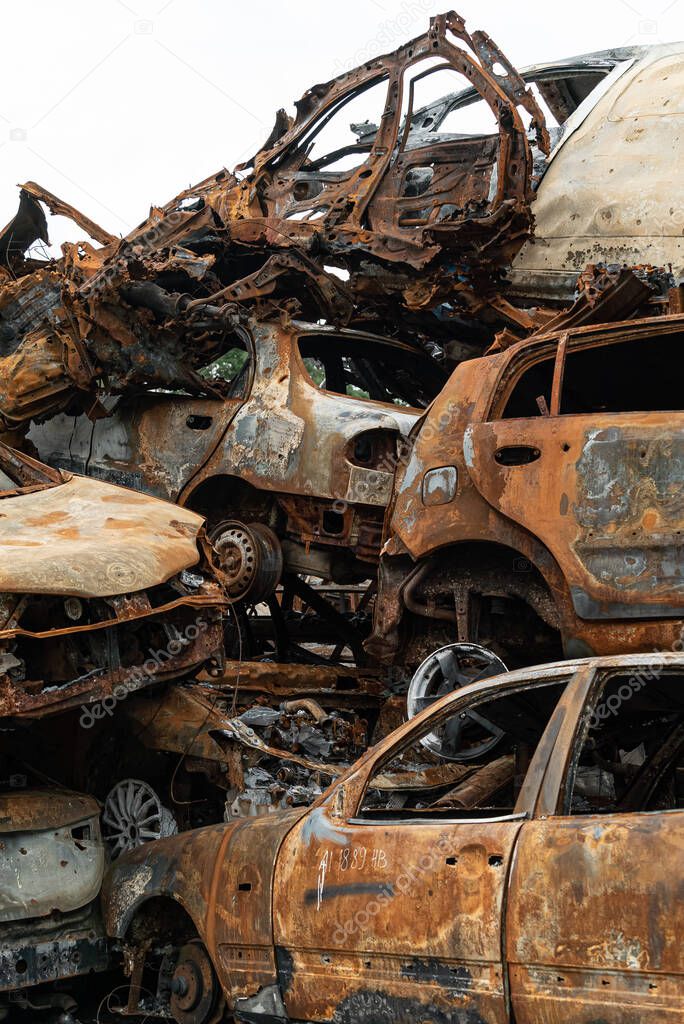 This stock photo shows a dump of shot and burned cars in Irpin, Bucha district