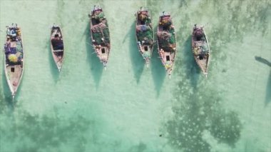 This stock video shows boats in the ocean off the coast of Zanzibar in 8K resolution