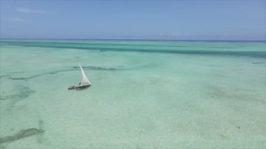This stock video shows boats in the ocean off the coast of Zanzibar in 8K resolution