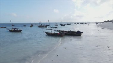 This stock video shows boats in the ocean off the coast of Zanzibar in 8K resolution